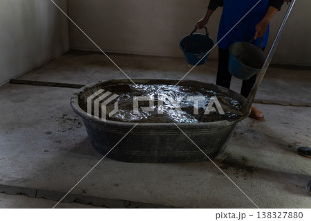 Concrete mixing process construction site image interior close-up building foundation Concrete mixing process construction site image interior close-up building foundation 138327880