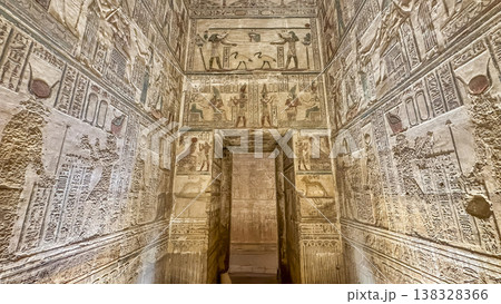 Beautiful wall paintings and bas-reliefs inside the ancient temple complex of Dendera, Qena, Egypt Beautiful wall paintings and bas-reliefs inside the ancient temple complex of Dendera, Qena, Egypt 138328366