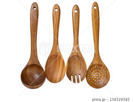 wooden kitchen spoons isolated on a white background 138329385