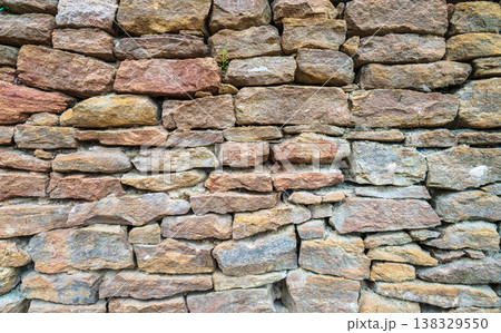 Backgrounds of the old stone wall. 138329550
