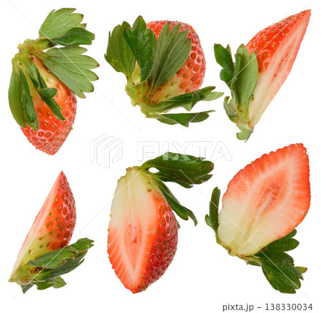 Halves of red ripe strawberries with green sepals on isolated background Halves of red ripe strawberries with green sepals on isolated background 138330034