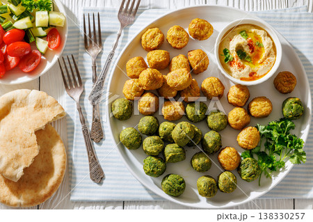 Middle eastern falafel with hummus on a plate 138330257