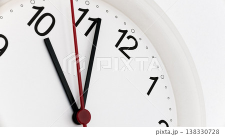 Closeup clock ticking showing ten hours 138330728