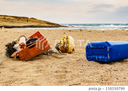 Beach with old fishing rope net. 138330790