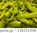 Top view of fresh organic long green chili peppers background pattern at farmers market 138331506