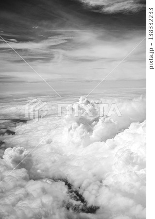 Black and white aerial view above clouds Black and white aerial view above clouds 138332233