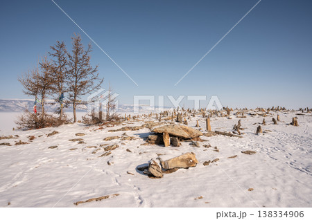 Strange shaped rocks arranged on Olkhon island in lake Baikal, Russia. 138334906