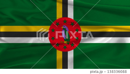 Flag of Dominica with fabric textured background. Close up of National flag of Dominica with realistic texture 138336088