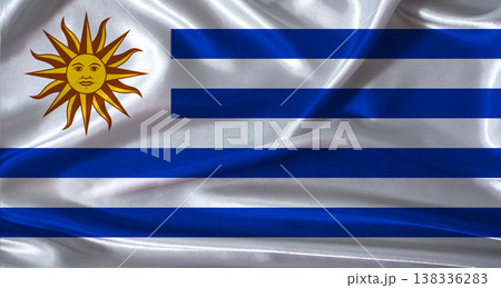Uruguay flag with cloth textured background. National flag of Uruguay with realistic texture Uruguay flag with cloth textured background. National flag of Uruguay with realistic texture 138336283