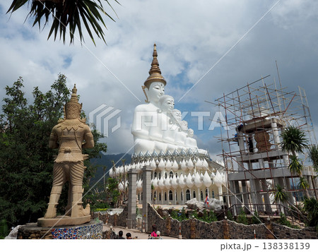 Oct 21 2016, Phetchboon Thailand, White statue temple mountain, green valley, blue sky scene Oct 21 2016, Phetchboon Thailand, White statue temple mountain, green valley, blue sky scene 138338139
