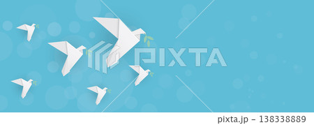 3D flock of white origami peace doves with olive leaf flies in the sky background have blank space. 3D flock of white origami peace doves with olive leaf flies in the sky background have blank space. 138338889