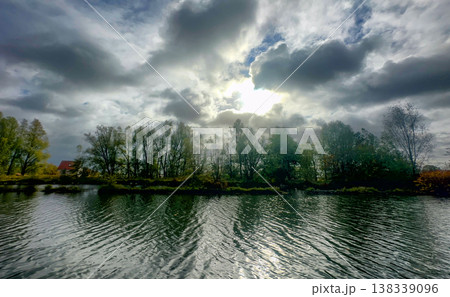 Rijkevorsel, Antwerpse Kempen, Belgium, Intense storm clouds and textured water create atmospheric 138339096
