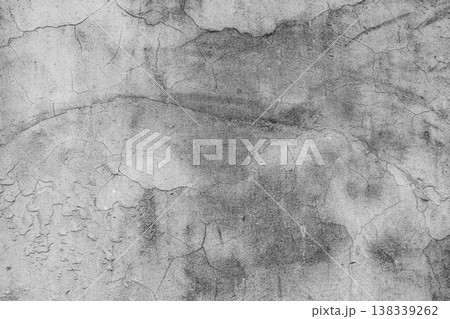 Grungy cracked concrete wall texture with distressed cement surface. Ideal for industrial loft background, architectural design, and vintage urban style backdrop. 138339262