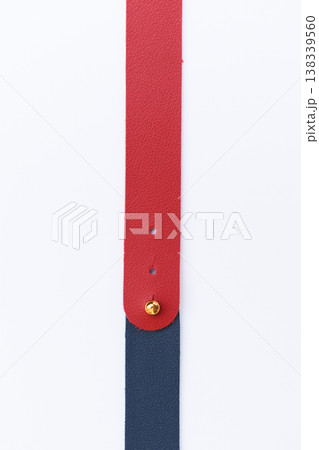 dark blue and red leather strap isolated on white background dark blue and red leather strap isolated on white background 138339560