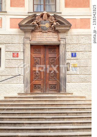 Ancient ornate carved wooden door and Baroque portal at Prague Castle 138342825