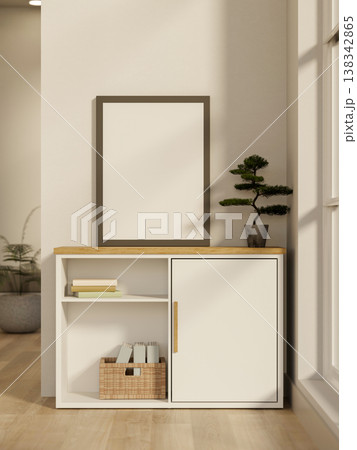 Empty black photo frame and bonsai tree pot on wooden top cabinet aside white wall in the modern room 138342865