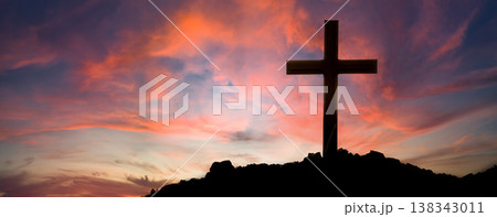 The cross standing on meadow sunset and bokeh background. The cross standing on meadow sunset and bokeh background. 138343011