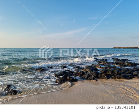 This is Gwakji Beach in Jeju Island, which has basalt rocks. 138343101