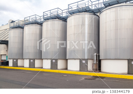 large industrial fermentation tanks at brewery large industrial fermentation tanks at brewery 138344179