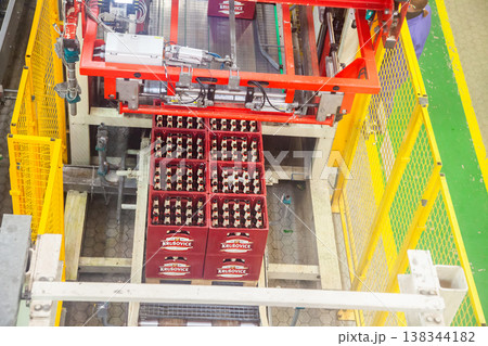 Conveyor transporting full beer crates in a brewery Conveyor transporting full beer crates in a brewery 138344182