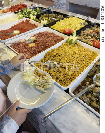 Buffet salad bar vegetables pasta corn self service restaurant Buffet salad bar vegetables pasta corn self service restaurant 138346050