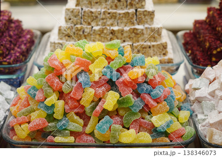Colorful gummy candies assortment sweet sugar coated jelly display 138346073