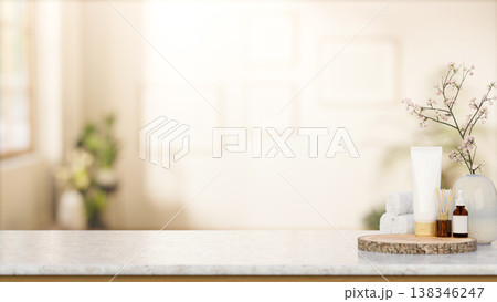 Wooden log tray aside towels with skincare bottle and diffuser on white marble counter in a spa room Wooden log tray aside towels with skincare bottle and diffuser on white marble counter in a spa room 138346247
