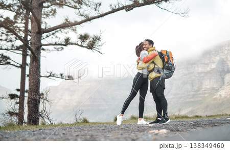 Love, hug and hike with couple in nature for support, trekking adventure and date. Wellness, explore and tourism with man and woman outdoor for travel holiday, journey and vacation getaway together Love, hug and hike with couple in nature for support, trekking adventure and date. Wellness, explore and tourism with man and woman outdoor for travel holiday, journey and vacation getaway together 138349460