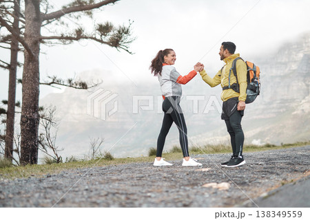 Love, high five and hike with couple in nature for support, trekking adventure and date. Wellness, explore and tourism with man and woman outdoor for travel holiday, journey and vacation getaway 138349559