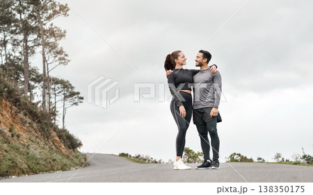 Couple, fitness and hug with smile for outdoor workout, break or training together. Nature space, man and woman with runner, exercise or rest for cardio challenge, health or wellness on mountain 138350175
