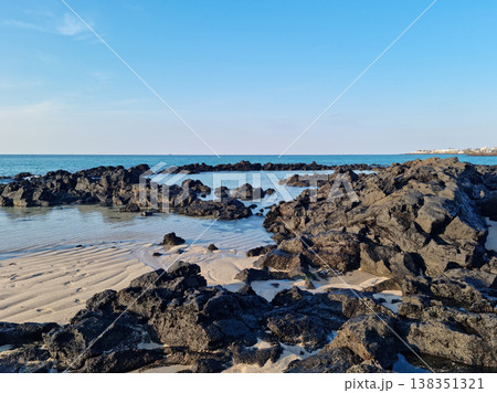 This is a Jeju seascape with basalt rocks. This is a Jeju seascape with basalt rocks. 138351321