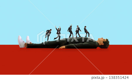 Businessman lying on floor with miniature man walk across his body on colorful background. Businessman lying on floor with miniature man walk across his body on colorful background. 138351424