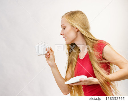 Blonde girl with coffee cup Blonde girl with coffee cup 138352765