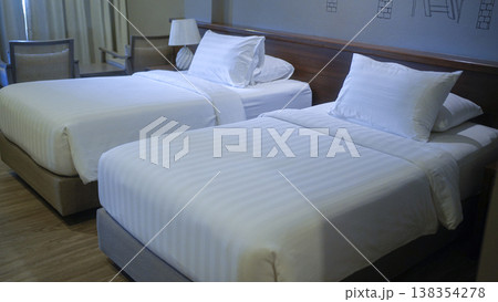 Bright and Fresh Bedroom Suite with double beds. hotel room with bright fresh colors in Bali style. 138354278