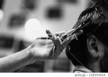 Intimate Monochrome Exploration Of Barbering Techniques Emphasizing Tool Motion And Hand Placement 138354454