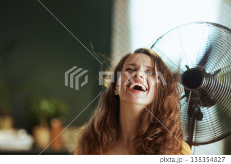 Woman\'s Infectious Laughter Amidst Cool Breeze 138354827