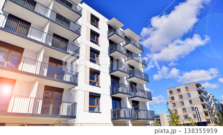 Apartments in residential complex. Housing structure at modern house.  Architecture for property investment. and architecture details. Urban abstract - windows of apartment building. 138355959