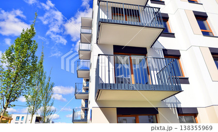 Apartments in residential complex. Housing structure at modern house. Architecture for property investment. and architecture details. Urban abstract - windows of apartment building. Apartments in residential complex. Housing structure at modern house. Architecture for property investment. and architecture details. Urban abstract - windows of apartment building. 138355969