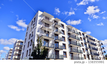 Apartments in residential complex. Housing structure at modern house. Architecture for property investment. and architecture details. Urban abstract - windows of apartment building. Apartments in residential complex. Housing structure at modern house. Architecture for property investment. and architecture details. Urban abstract - windows of apartment building. 138355991
