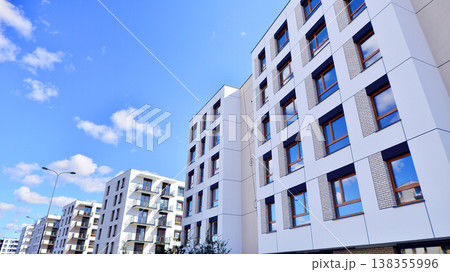 Apartments in residential complex. Housing structure at modern house. Architecture for property investment. and architecture details. Urban abstract - windows of apartment building. Apartments in residential complex. Housing structure at modern house. Architecture for property investment. and architecture details. Urban abstract - windows of apartment building. 138355996