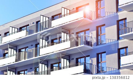 Apartments in residential complex. Housing structure at modern house. Architecture for property investment. and architecture details. Urban abstract - windows of apartment building. Apartments in residential complex. Housing structure at modern house. Architecture for property investment. and architecture details. Urban abstract - windows of apartment building. 138356812