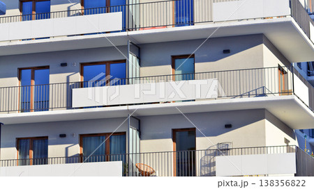 Apartments in residential complex. Housing structure at modern house.  Architecture for property investment. and architecture details. Urban abstract - windows of apartment building. 138356822