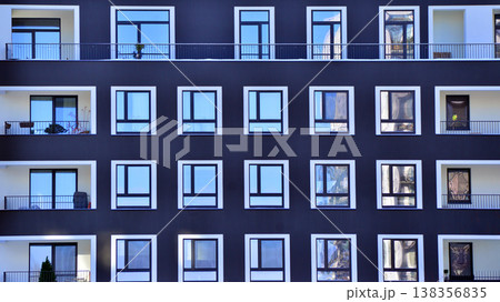 Apartments in residential complex. Housing structure at modern house. Architecture for property investment. and architecture details. Urban abstract - windows of apartment building. Apartments in residential complex. Housing structure at modern house. Architecture for property investment. and architecture details. Urban abstract - windows of apartment building. 138356835