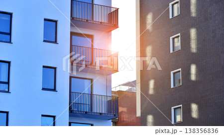 Apartments in residential complex. Housing structure at modern house. Architecture for property investment. and architecture details. Urban abstract - windows of apartment building. Apartments in residential complex. Housing structure at modern house. Architecture for property investment. and architecture details. Urban abstract - windows of apartment building. 138356836