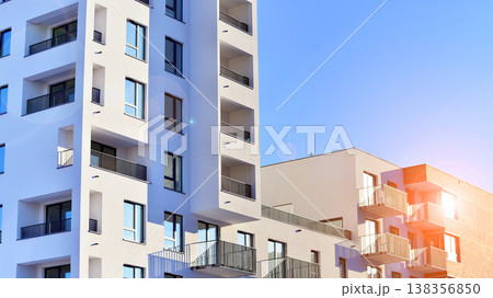Apartments in residential complex. Housing structure at modern house. Architecture for property investment. and architecture details. Urban abstract - windows of apartment building. Apartments in residential complex. Housing structure at modern house. Architecture for property investment. and architecture details. Urban abstract - windows of apartment building. 138356850