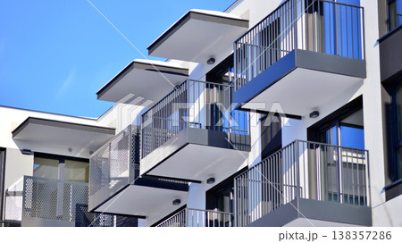 Apartments in residential complex. Housing structure at modern house. Architecture for property investment. and architecture details. Urban abstract - windows of apartment building. Apartments in residential complex. Housing structure at modern house. Architecture for property investment. and architecture details. Urban abstract - windows of apartment building. 138357286