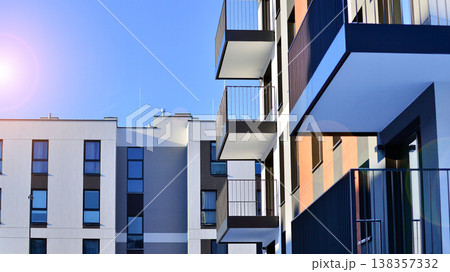 Apartments in residential complex. Housing structure at modern house. Architecture for property investment. and architecture details. Urban abstract - windows of apartment building. Apartments in residential complex. Housing structure at modern house. Architecture for property investment. and architecture details. Urban abstract - windows of apartment building. 138357332