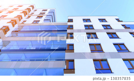 Apartments in residential complex. Housing structure at modern house.  Architecture for property investment. and architecture details. Urban abstract - windows of apartment building. 138357835