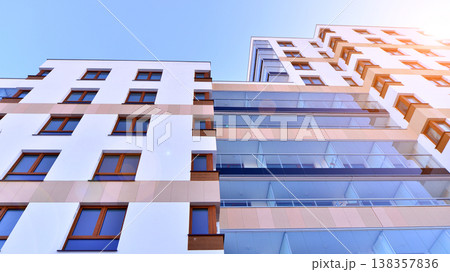 Apartments in residential complex. Housing structure at modern house. Architecture for property investment. and architecture details. Urban abstract - windows of apartment building. Apartments in residential complex. Housing structure at modern house. Architecture for property investment. and architecture details. Urban abstract - windows of apartment building. 138357836