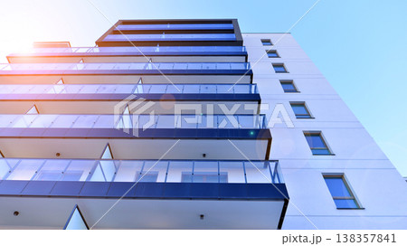 Apartments in residential complex. Housing structure at modern house.  Architecture for property investment. and architecture details. Urban abstract - windows of apartment building. 138357841